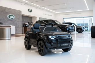 Land Rover Defender 12v Kids Ride On Car with Remote in Black - Leather Seat & EVA Wheels
